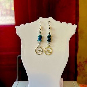 Hand made genuine aquamarine with wave charm.